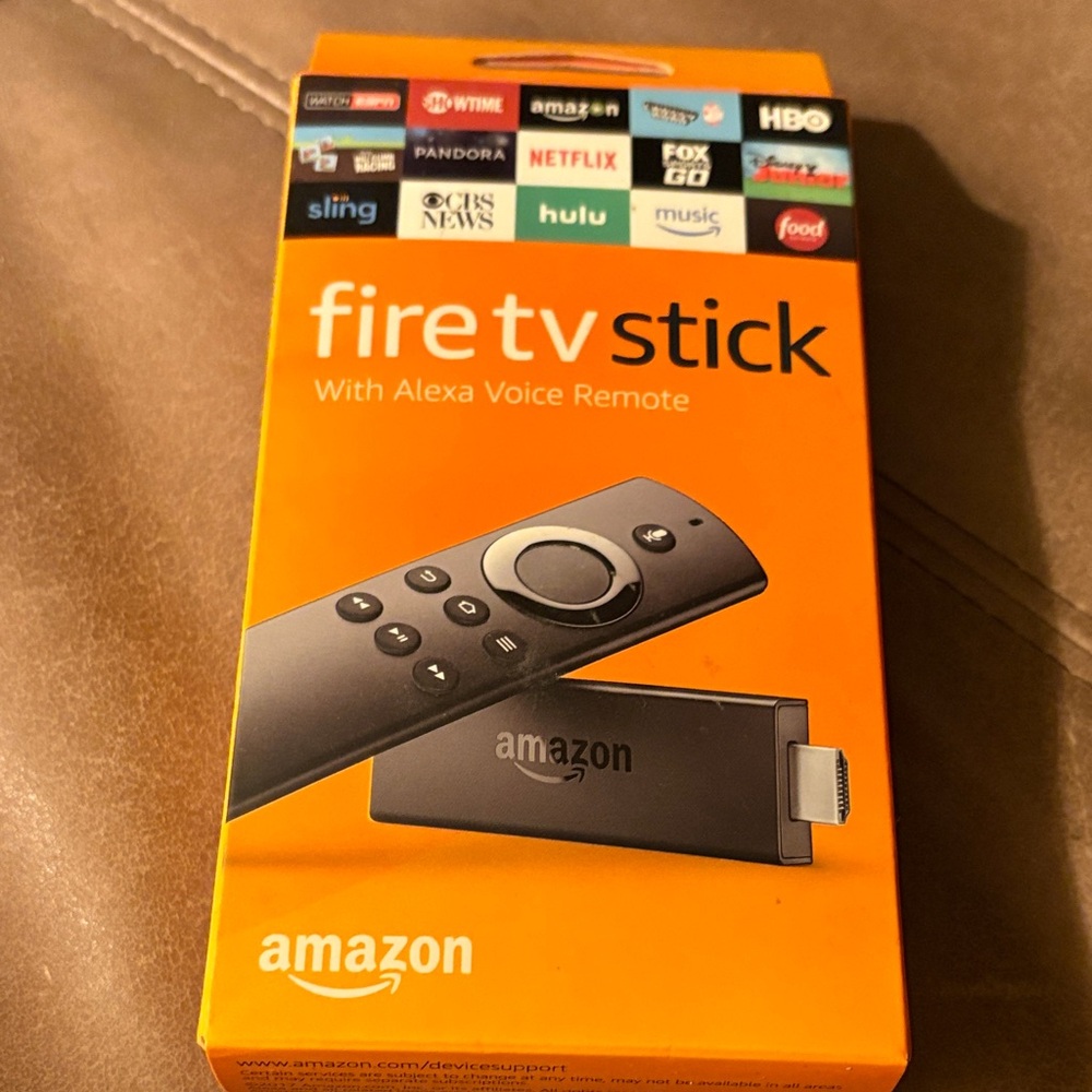 Amazon Fire TV Stick with Alexa Remote - Black and Orange